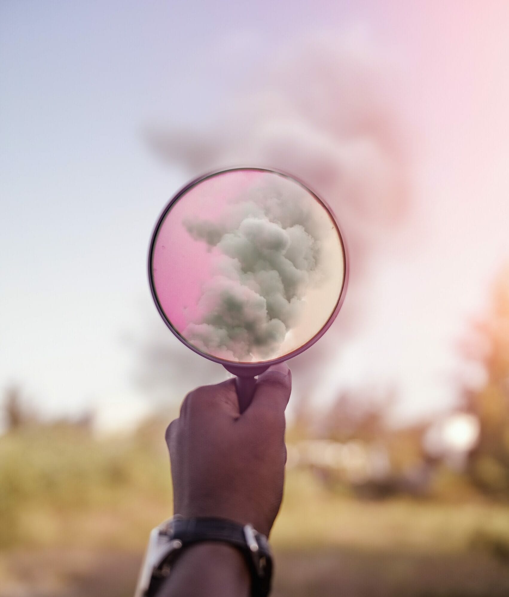 magnifying glass showing smoke