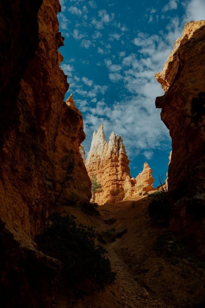 Tall rock formations under a blue sky