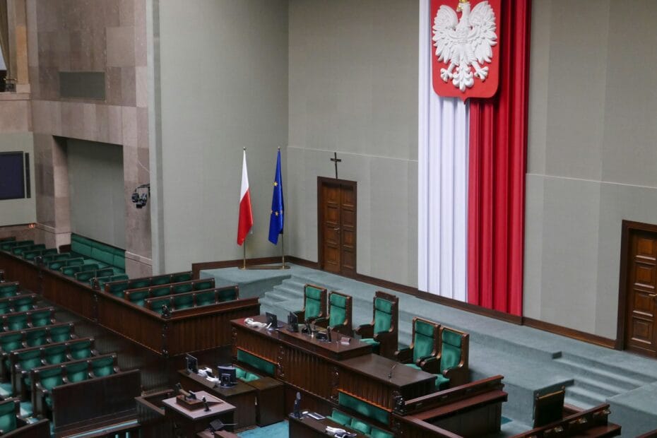 red white and blue flag on white wall