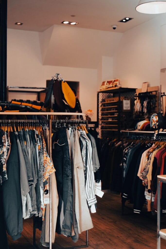 a rack of clothes in a clothing store